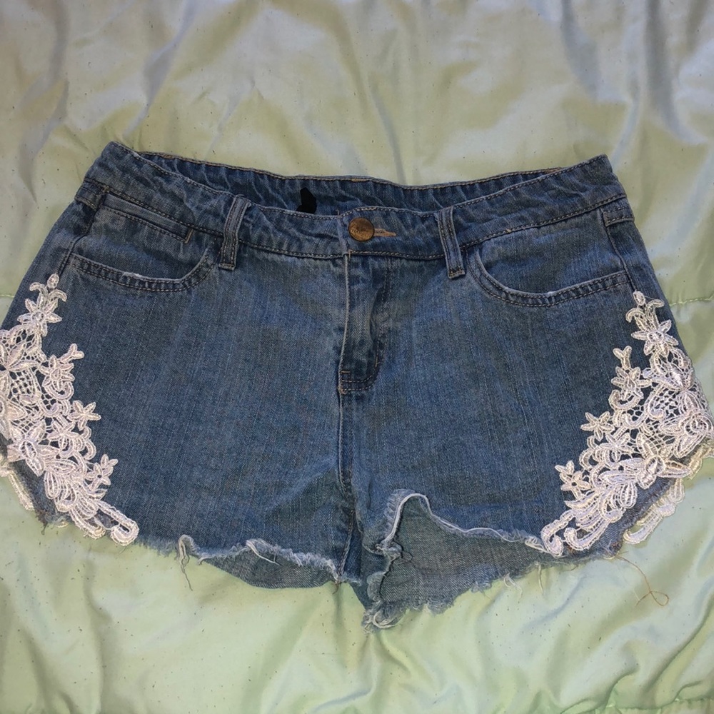 Blue jean shorts with lace detail